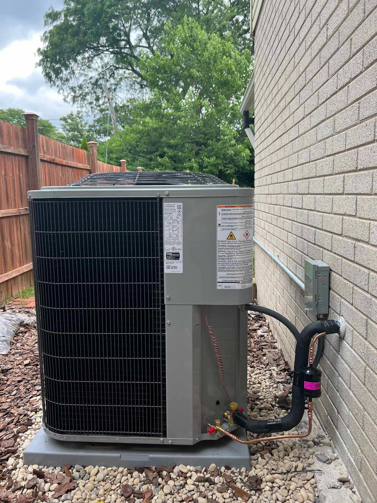New air conditioning condenser installed by American Mechanical Works in the Chicago North Shore