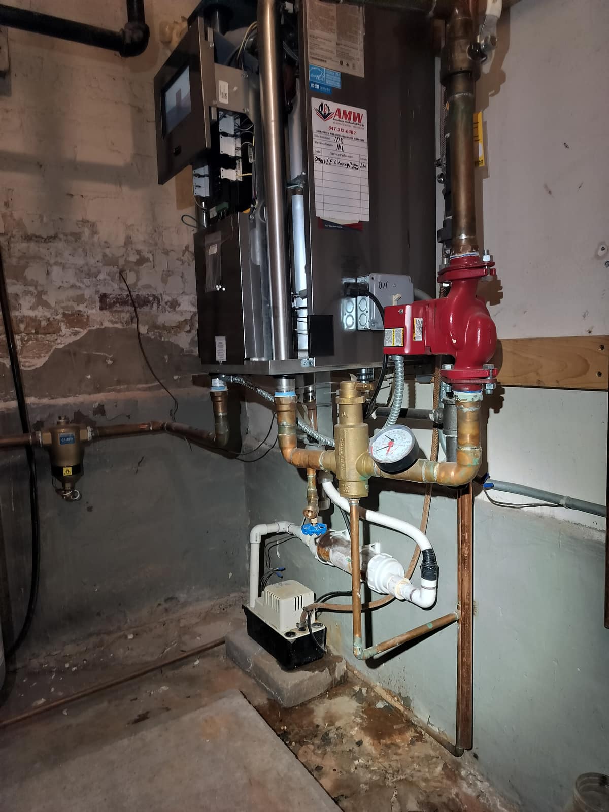 Hydronic boiler and zone-control piping installed by American Mechanical Works