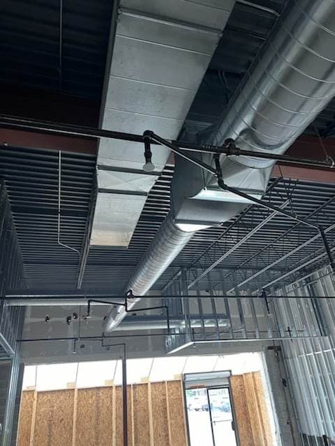 Custom sheet-metal ductwork fabricated and installed by American Mechanical Works
