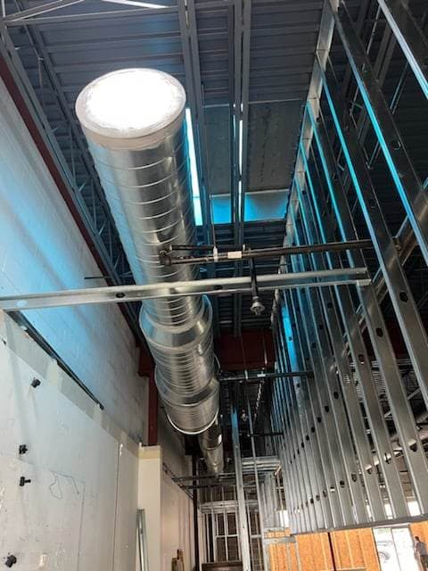 Custom sheet-metal ductwork fabricated and installed by American Mechanical Works
